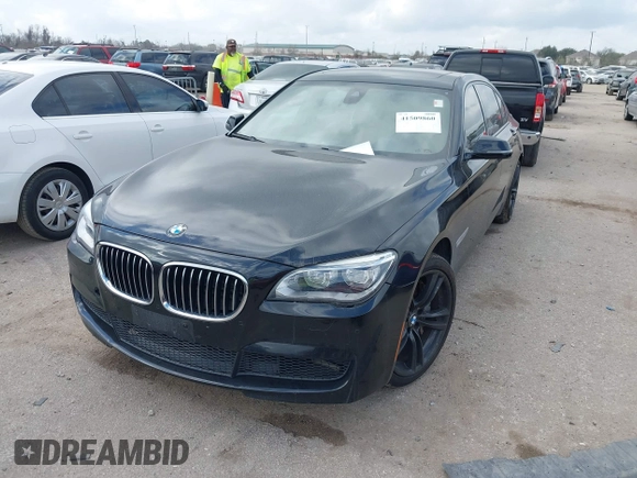 2013 BMW 7 Series 750Li with VIN WBAYE8C55DD133178, listed as a IAAI auction lot 41509860 with 90,841 mi miles and . Bid and sale history available at DreamBid. Image 17.