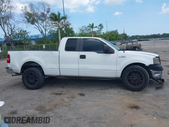 2007 Ford F-150 STX with VIN 1FTRX12W87NA44206, listed as a IAAI auction lot 42332828 with 179,610 mi miles and . Bid and sale history available at DreamBid. Image 14.