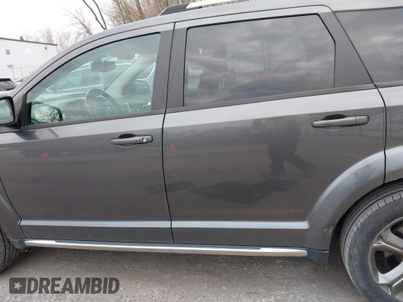 2015 Dodge Journey Crossroad with VIN 3C4PDCGB0FT639390, listed as a IAAI auction lot 41881370 with 164,219 mi miles and . Bid and sale history available at DreamBid. Image 14.