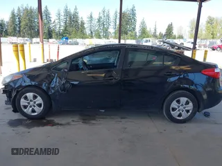 2015 Kia Forte LX with VIN KNAFK4A60F5290540, listed as a IAAI auction lot 42046059 with 107,232 mi miles. Bid and sale history available at carsss.com. Image 15.