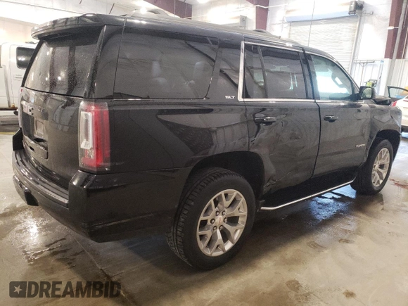 2019 GMC Yukon SLT with VIN 1GKS2BKC2KR238408, listed as a Copart auction lot 54893895 with 69,949 mi miles and Salvage Title. Bid and sale history available at DreamBid. Image 3.