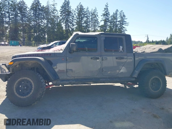 2023 Jeep Gladiator Rubicon with VIN 1C6JJTBG6PL538859, listed as a IAAI auction lot 42633055 with 22,899 mi miles and . Bid and sale history available at DreamBid. Image 15.