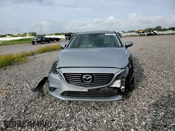 2016 Mazda 6 i Grand Touring с VIN JM1GJ1W53G1434499, выставлен на аукционе Copart как лот 54739745 с пробегом Не указан миль и Списание • Salvage title. История ставок и продаж доступна на DreamBid. Изображение 13.