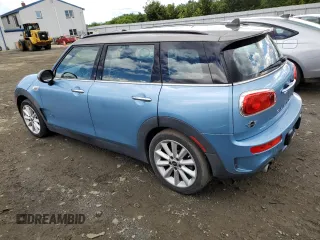 2017 MINI Clubman Cooper S z VIN WMWLU5C5XH2E83566, wystawiony jako Copart lot #57919305 z przebiegiem 89 983 mil mil oraz Tytuł czysty. Historia ofert i sprzedaży dostępna na DreamBid. Obrazek 2.