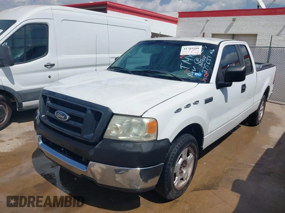 2005 Ford F-150 STX with VIN 1FTRX12W85NB75651, listed as a IAAI auction lot 41789580 with 235,133 mi miles. Bid and sale history available at carsss.com. Image 2.