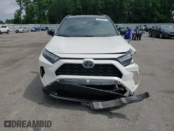 2022 Toyota RAV4 Hybrid XSE with VIN 2T3E6RFVXNW031612, listed as a Copart auction lot 60544055 with 99,831 mi miles and Salvage title. Bid and sale history available at DreamBid. Image 14.