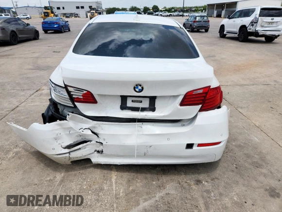 2016 BMW 5 Series 528i with VIN WBA5A5C59GD528109, listed as a Copart auction lot 61691405 with 107,837 mi miles and Salvage title. Bid and sale history available at DreamBid. Image 6.