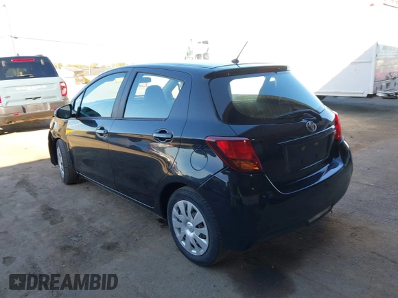 2015 Toyota Yaris L with VIN VNKKTUD32FA030980, listed as a IAAI auction lot 41655132 with 106,826 mi miles and . Bid and sale history available at carsss.com. Image 3.