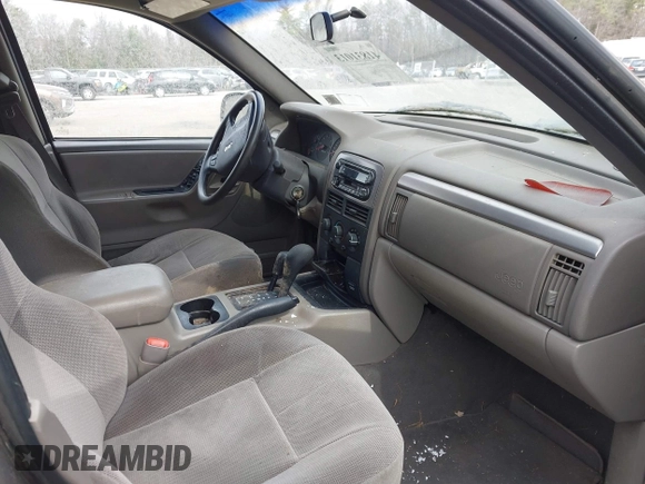 2001 Jeep Grand Cherokee Laredo with VIN 1J4GW48SX1C658610, listed as a IAAI auction lot 41831013 with 200,142 mi miles and . Bid and sale history available at DreamBid. Image 5.