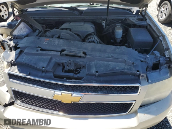 2013 Chevrolet Suburban LT with VIN 1GNSCJE06DR140058, listed as a Copart auction lot 56317995 with 124,345 mi miles and Salvage title. Bid and sale history available at DreamBid. Image 12.