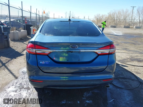 2018 Ford Fusion S with VIN 3FA6P0G77JR129224, listed as a IAAI auction lot 41483648 with 104,045 mi miles. Bid and sale history available at carsss.com. Image 16.