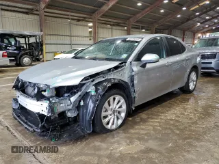 2023 Toyota Camry LE z VIN 4T1C11AK6PU082458, wystawiony jako Copart lot #56209395 z przebiegiem 38 806 mil mil oraz Szkoda całkowita • Salvage title. Historia ofert i sprzedaży dostępna na DreamBid. Obrazek 1.