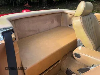 1987 Mercedes-Benz 560 with VIN WDBBA48D8HA065591, listed as a Copart auction lot 73538474 with 119,516 mi miles and Clean Title. Bid and sale history available at carsss.com. Image 6.
