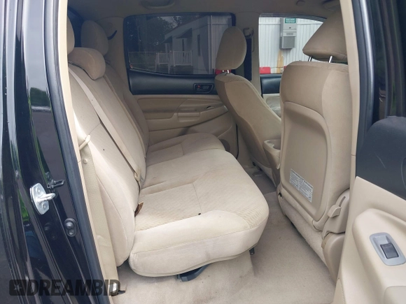 2011 Toyota Tacoma with VIN 3TMLU4EN9BM058136, listed as a IAAI auction lot 42470638 with 143,074 mi miles and . Bid and sale history available at DreamBid. Image 8.