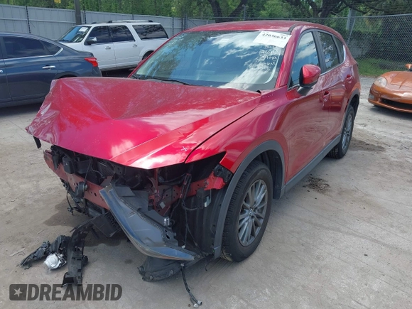 2019 Mazda CX-5 Touring with VIN JM3KFACM6K1549234, listed as a IAAI auction lot 42036633 with 85,065 mi miles and . Bid and sale history available at carsss.com. Image 2.
