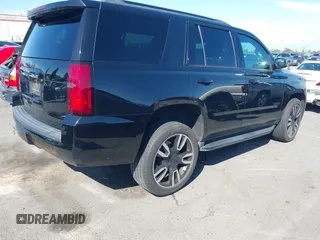 2019 Chevrolet Tahoe LT with VIN 1GNSCBKC4KR114608, listed as a IAAI auction lot 41954543 with 64,007 mi miles and . Bid and sale history available at DreamBid. Image 4.