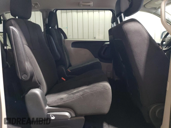 2014 Dodge Grand Caravan SXT z VIN 2C4RDGCGXER138025, wystawiony jako Copart lot #57941985 z przebiegiem 87 055 mil mil oraz Szkody całkowita. Historia ofert i sprzedaży dostępna na DreamBid. Obrazek 11.