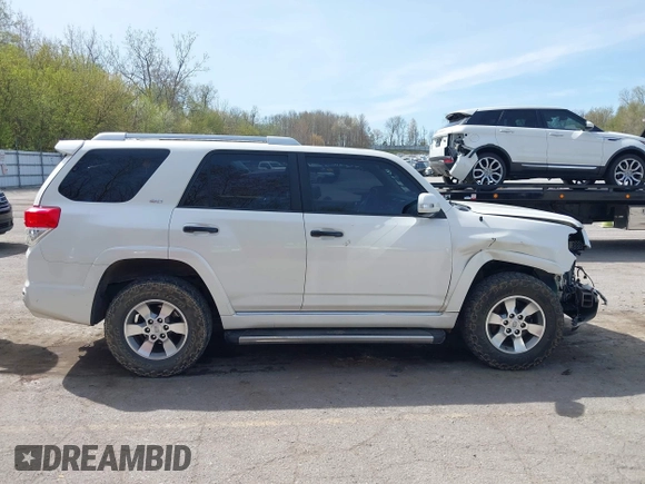 2012 Toyota 4Runner SR5 with VIN JTEBU5JR8C5104925, listed as a IAAI auction lot 42138879 with 181,138 mi miles and . Bid and sale history available at DreamBid. Image 14.