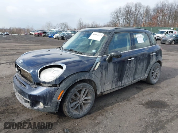 2013 MINI Countryman S ALL4 with VIN WMWZC5C58DWP30936, listed as a IAAI auction lot 41314553 with 128,405 mi miles and . Bid and sale history available at DreamBid. Image 2.