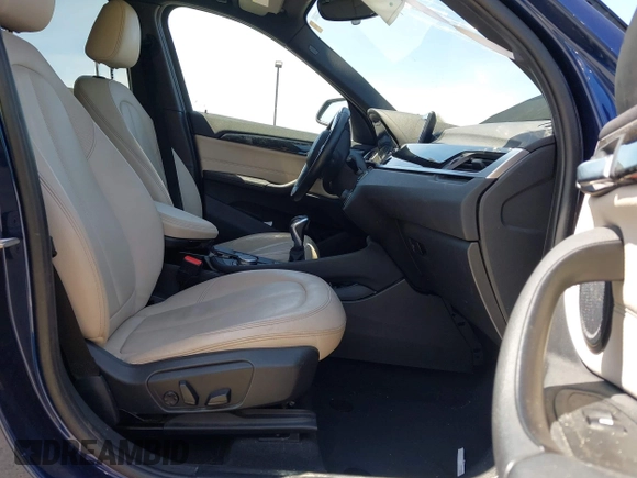2017 BMW X1 xDrive28i with VIN WBXHT3C39H5F71525, listed as a IAAI auction lot 42050272 with 118,875 mi miles. Bid and sale history available at carsss.com. Image 5.
