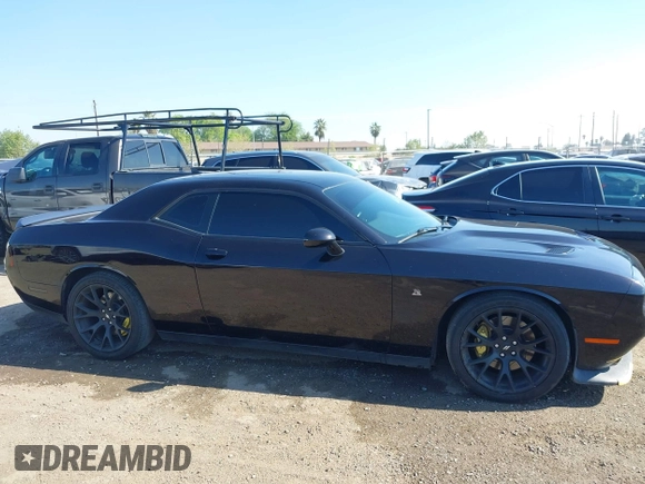 2019 Dodge Challenger R/T Scat Pack z VIN 2C3CDZFJ9KH556896, wystawiony jako IAAI lot #41892608 z przebiegiem 60 747 mil mil oraz . Historia ofert i sprzedaży dostępna na DreamBid. Obrazek 13.