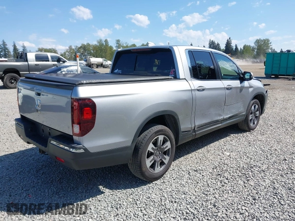 2019 Honda Ridgeline RTL with VIN 5FPYK3F54KB018272, listed as a IAAI auction lot 42184895 with 75,362 mi miles and . Bid and sale history available at DreamBid. Image 4.