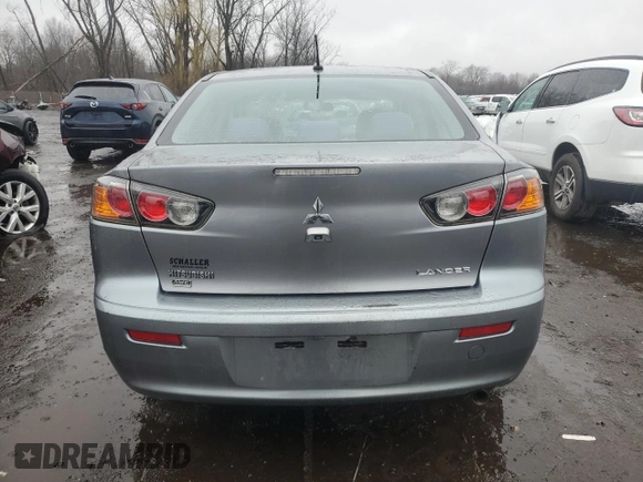2014 Mitsubishi Lancer SE z VIN JA32V2FW8EU020237, wystawiony jako Copart lot #50333595 z przebiegiem 128 289 mil mil oraz Szkoda całkowita • Salvage title. Historia ofert i sprzedaży dostępna na DreamBid. Obrazek 6.
