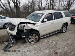 2015 GMC Yukon SLT with VIN 1GKS2BKC9FR597521, listed as a Copart auction lot 46342975 with 219,146 mi miles and Salvage Title. Bid and sale history available at carsss.com. Image 1.