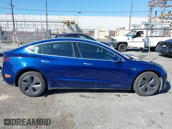 2019 Tesla Model 3 Mid Range with VIN 5YJ3E1EA8KF436086, listed as a IAAI auction lot 41682093 with 70,332 mi miles and . Bid and sale history available at DreamBid. Image 13.
