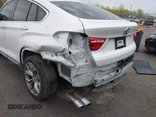 2018 BMW X4 xDrive28i z VIN 5UXXW3C57J0T82081, wystawiony jako IAAI lot #41991254 z przebiegiem 100 654 mil mil oraz . Historia ofert i sprzedaży dostępna na DreamBid. Obrazek 6.