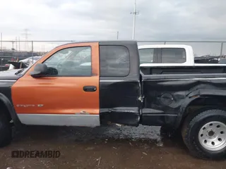 2002 Dodge Dakota z VIN 1B7GG32X22S634407, wystawiony jako IAAI lot #41891953 z przebiegiem 222 595 mil mil oraz . Historia ofert i sprzedaży dostępna na DreamBid. Obrazek 14.