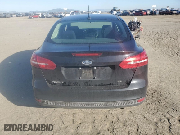 2018 Ford Focus SE with VIN 1FADP3F21JL288026, listed as a Copart auction lot 46908205 with 70,739 mi miles and Salvage Title. Bid and sale history available at carsss.com. Image 6.
