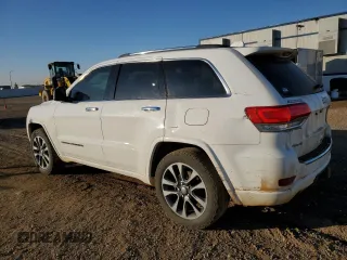 2017 Jeep Grand Cherokee Overland with VIN 1C4RJFCG3HC675125, listed as a Copart auction lot 50142865 with 113,819 mi miles and Salvage Title. Bid and sale history available at carsss.com. Image 2.