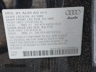 2012 Audi Q7 Premium Plus with VIN WA1LGAFEXCD008924, listed as a IAAI auction lot 42619348 with 153,529 mi miles and . Bid and sale history available at DreamBid. Image 9.