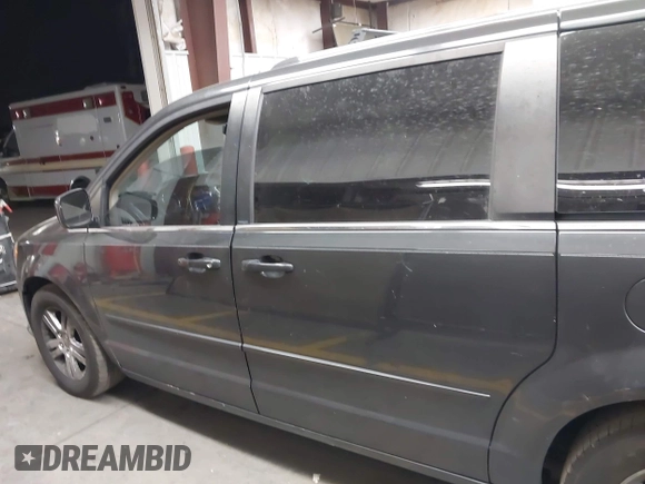 2011 Dodge Grand Caravan Crew with VIN 2D4RN5DG9BR683020, listed as a IAAI auction lot 42150221 with 200,730 mi miles and . Bid and sale history available at DreamBid. Image 14.