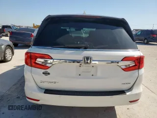 2018 Honda Odyssey Touring с VIN 5FNRL6H8XJB042111, выставлен на аукционе Copart как лот 52360005 с пробегом 126 835 миль миль и Чистый • Clean title. История ставок и продаж доступна на DreamBid. Изображение 6.