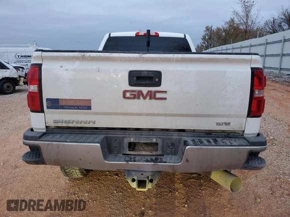 2018 GMC Sierra 2500HD z VIN 1GT12REY5JF232769, wystawiony jako Copart lot #82141064 z przebiegiem Nie podano mil oraz Szkoda całkowita • Salvage title. Historia ofert i sprzedaży dostępna na DreamBid. Obrazek 6.
