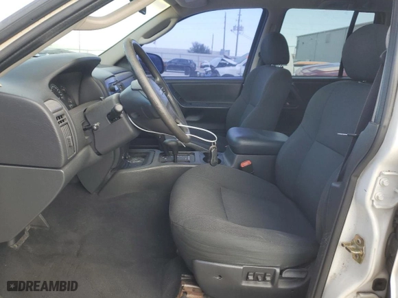 2002 Jeep Grand Cherokee Laredo with VIN 1J4GW48N02C205818, listed as a Copart auction lot 44737205 with 136,030 mi miles and Salvage Title. Bid and sale history available at carsss.com. Image 7.