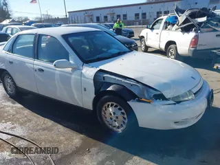 2002 Saturn LS z VIN 1G8JS54F62Y552871, wystawiony jako IAAI lot #41309003 z przebiegiem 124 216 mil mil oraz . Historia ofert i sprzedaży dostępna na DreamBid. Obrazek 1.