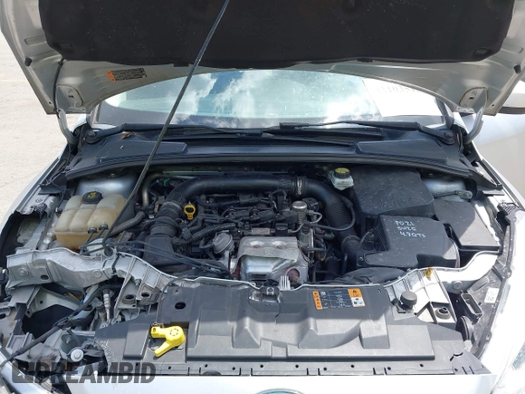 2018 Ford Focus SE z VIN 1FADP3FE9JL241661, wystawiony jako IAAI lot #42103513 z przebiegiem 117 003 mil mil oraz . Historia ofert i sprzedaży dostępna na DreamBid. Obrazek 10.