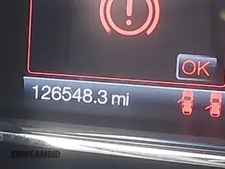 2013 Lincoln MKS EcoBoost with VIN 1LNHL9FT4DG607785, listed as a IAAI auction lot 42279833 with 126,548 mi miles and . Bid and sale history available at DreamBid. Image 15.