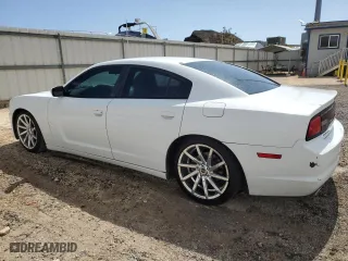 2014 Dodge Charger SE with VIN 2C3CDXBGXEH268355, listed as a Copart auction lot 49473765 with 130,373 mi miles and Clean Title. Bid and sale history available at carsss.com. Image 2.