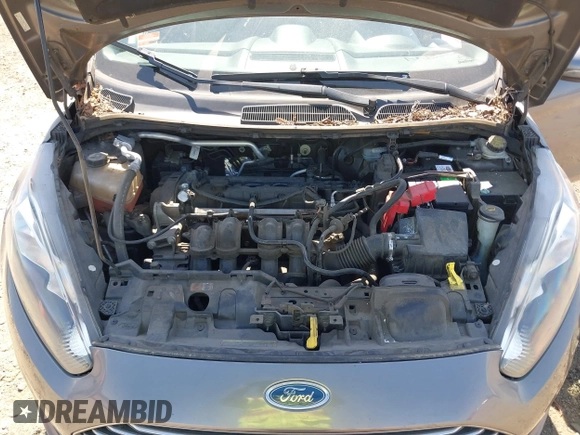 2014 Ford Fiesta SE z VIN 3FADP4BJ6EM117845, wystawiony jako IAAI lot #42431152 z przebiegiem 97 742 mil mil oraz . Historia ofert i sprzedaży dostępna na DreamBid. Obrazek 10.