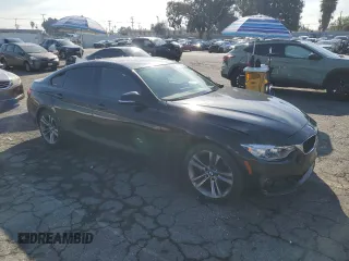 2015 BMW 4 Series 428i with VIN WBA4A5C57FD410621, listed as a Copart auction lot 42754235 with 122,822 mi miles and Salvage Title. Bid and sale history available at carsss.com. Image 4.