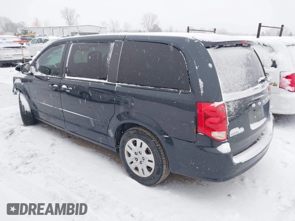 2013 Dodge Grand Caravan SE with VIN 2C4RDGBGXDR746630, listed as a IAAI auction lot 41239381 with 213,421 mi miles and . Bid and sale history available at DreamBid. Image 3.