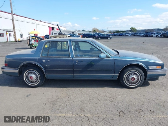1986 Cadillac Seville z VIN 1G6KS6989GU813079, wystawiony jako IAAI lot #41732353 z przebiegiem Nie podano mil oraz . Historia ofert i sprzedaży dostępna na DreamBid. Obrazek 13.