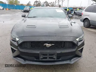 2018 Ford Mustang EcoBoost z VIN 1FA6P8TH3J5129088, wystawiony jako IAAI lot #41792548 z przebiegiem 55 991 mil mil oraz . Historia ofert i sprzedaży dostępna na DreamBid. Obrazek 12.