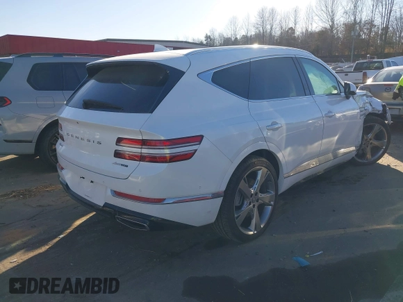 2023 Genesis GV80 with VIN KMUHCESC2PU144051, listed as a IAAI auction lot 41459754 with 14,978 mi miles and . Bid and sale history available at DreamBid. Image 4.