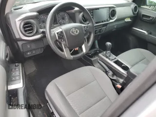 2021 Toyota Tacoma SR5 z VIN 3TYAZ5CN5MT004373, wystawiony jako Copart lot #58526145 z przebiegiem Nie podano mil oraz Szkoda całkowita • Salvage title. Historia ofert i sprzedaży dostępna na DreamBid. Obrazek 8.