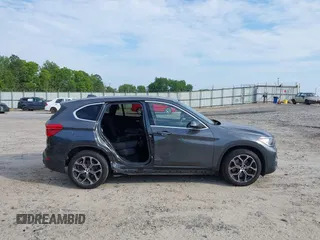 2020 BMW X1 xDrive28i with VIN WBXJG9C08L5R71788, listed as a IAAI auction lot 42604792 with 46,489 mi miles and . Bid and sale history available at DreamBid. Image 14.